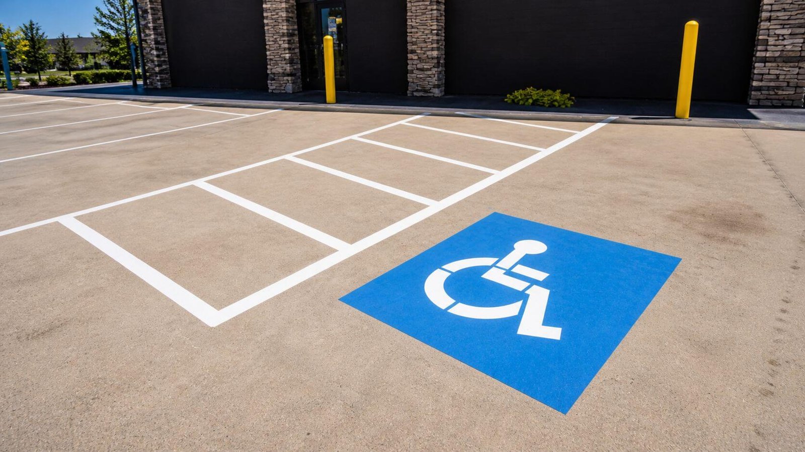 Commercial parking lot ADA markings and organized stalls