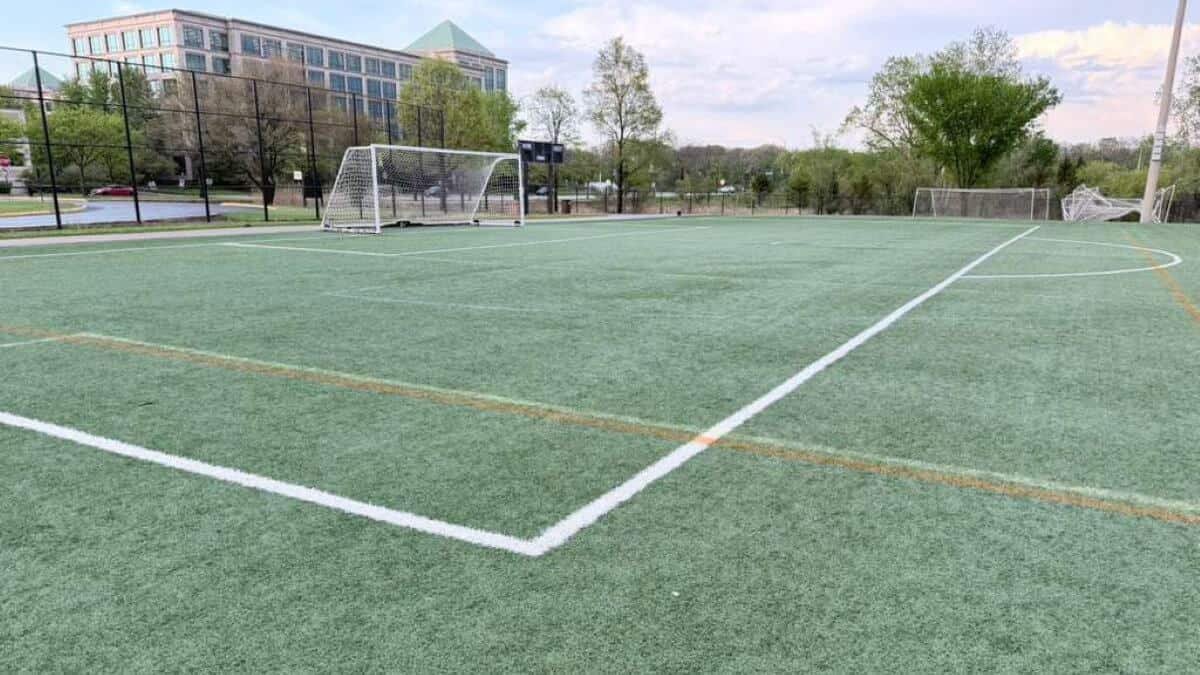 Athletic field and facility line marking on a multipurpose surface